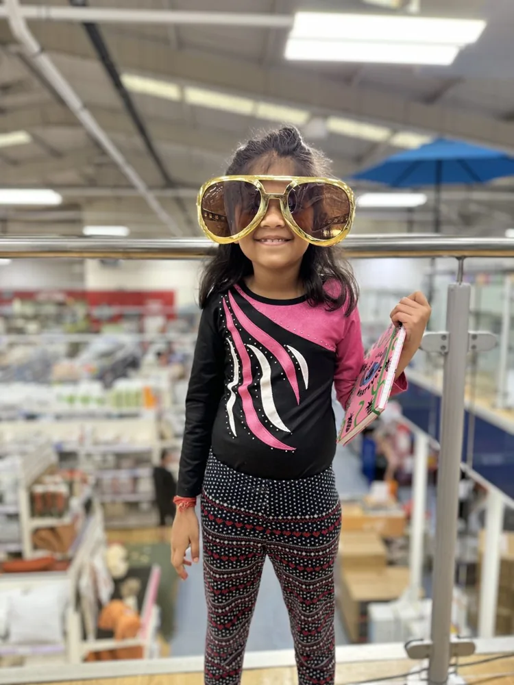 Nitara having fun in oversized sunglasses