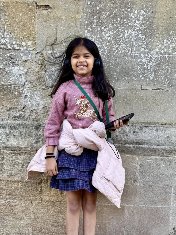 Nitara smiling on a day out
